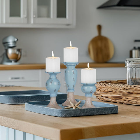 Sziqiqi pillar candle holders with distinct heights for balanced styling.