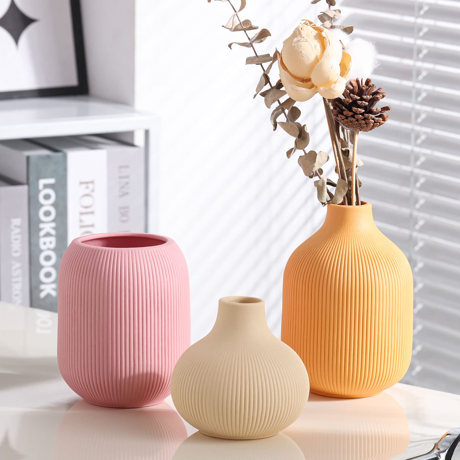 TanQoVone ceramic vase in light yellow multicolor, perfect as a table centerpiece.