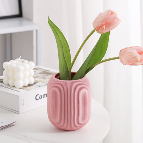 TanQoVone ceramic vase in orange multicolor, adds warm tones to any space.