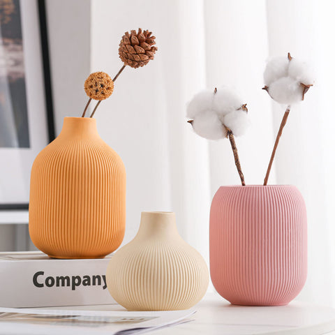 TanQoVone orange ribbed vase, enhances dining table centerpieces with color.
