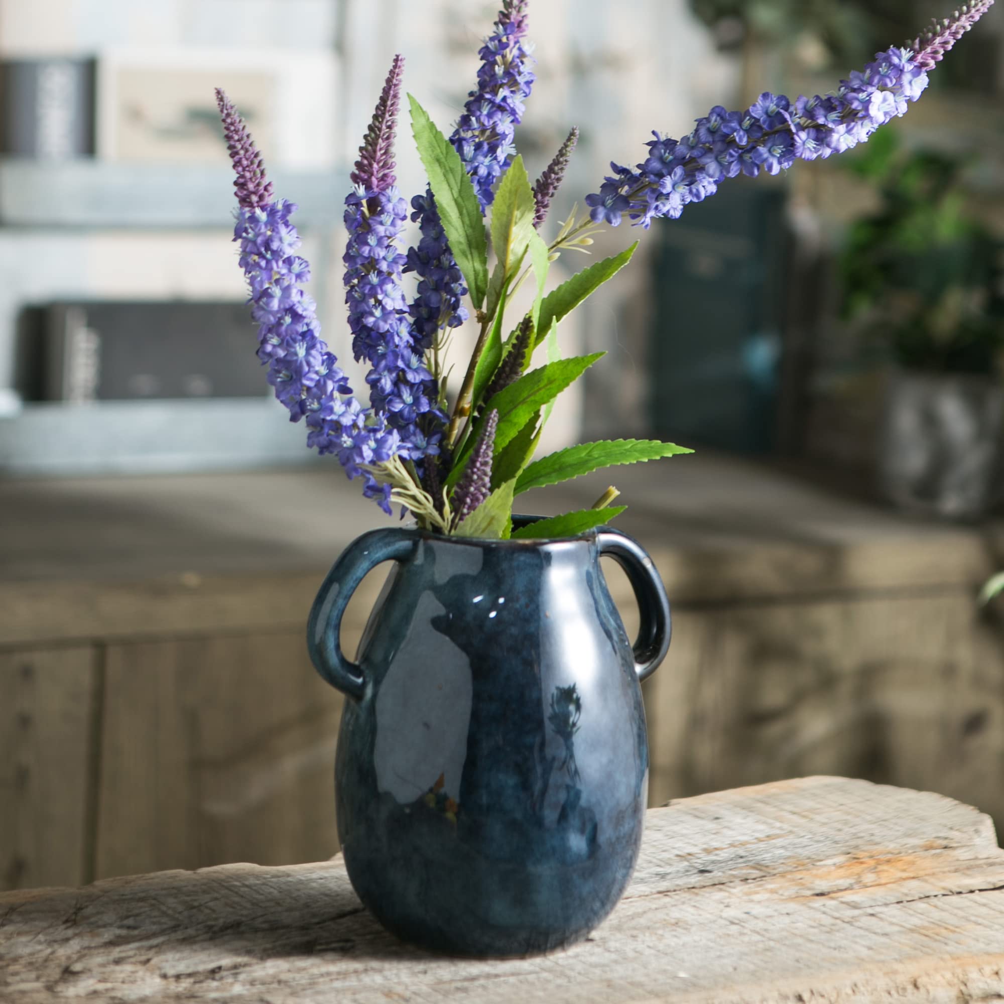 Tanvecle blue vase closeup glaze highlights rich color and farmhouse charm.