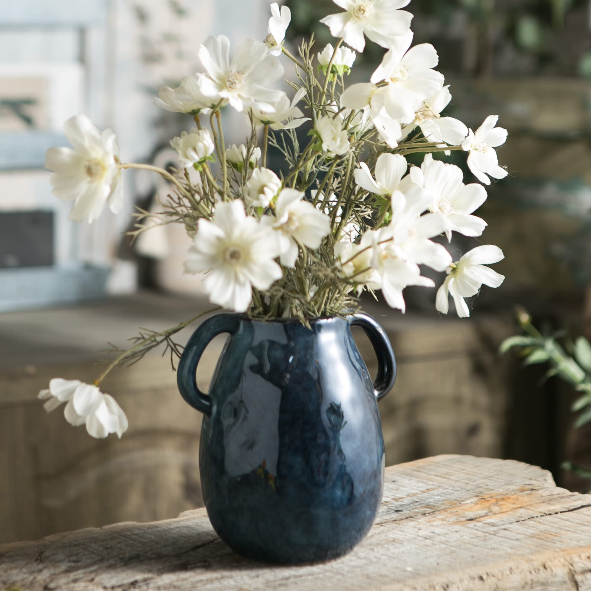 Tanvecle seven-inch vase pairs with existing décor to frame artwork.