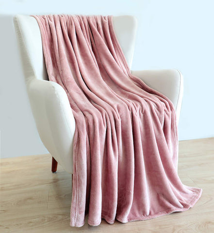 TASTHROW 60x80 blanket draped over bed for all-season warmth