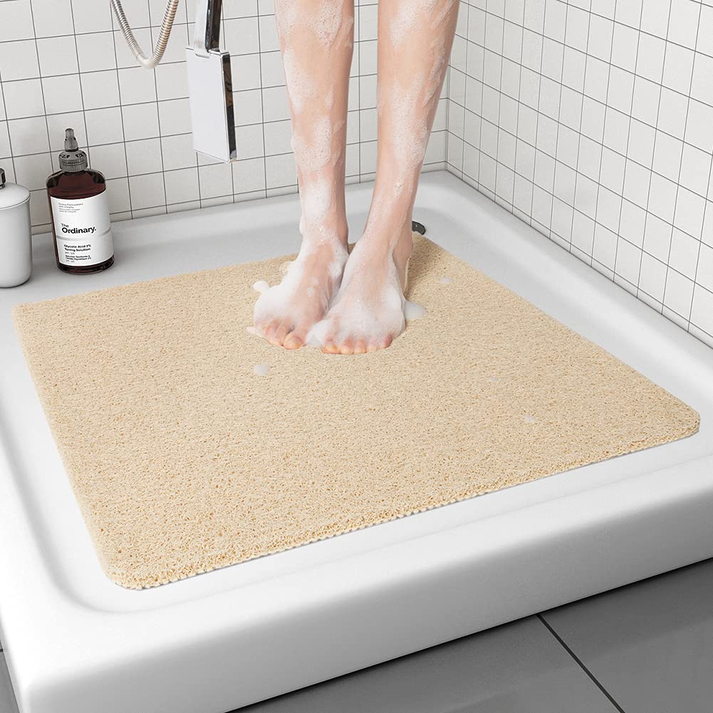 Tchdio non-slip shower mat on textured surface for safer footing.
