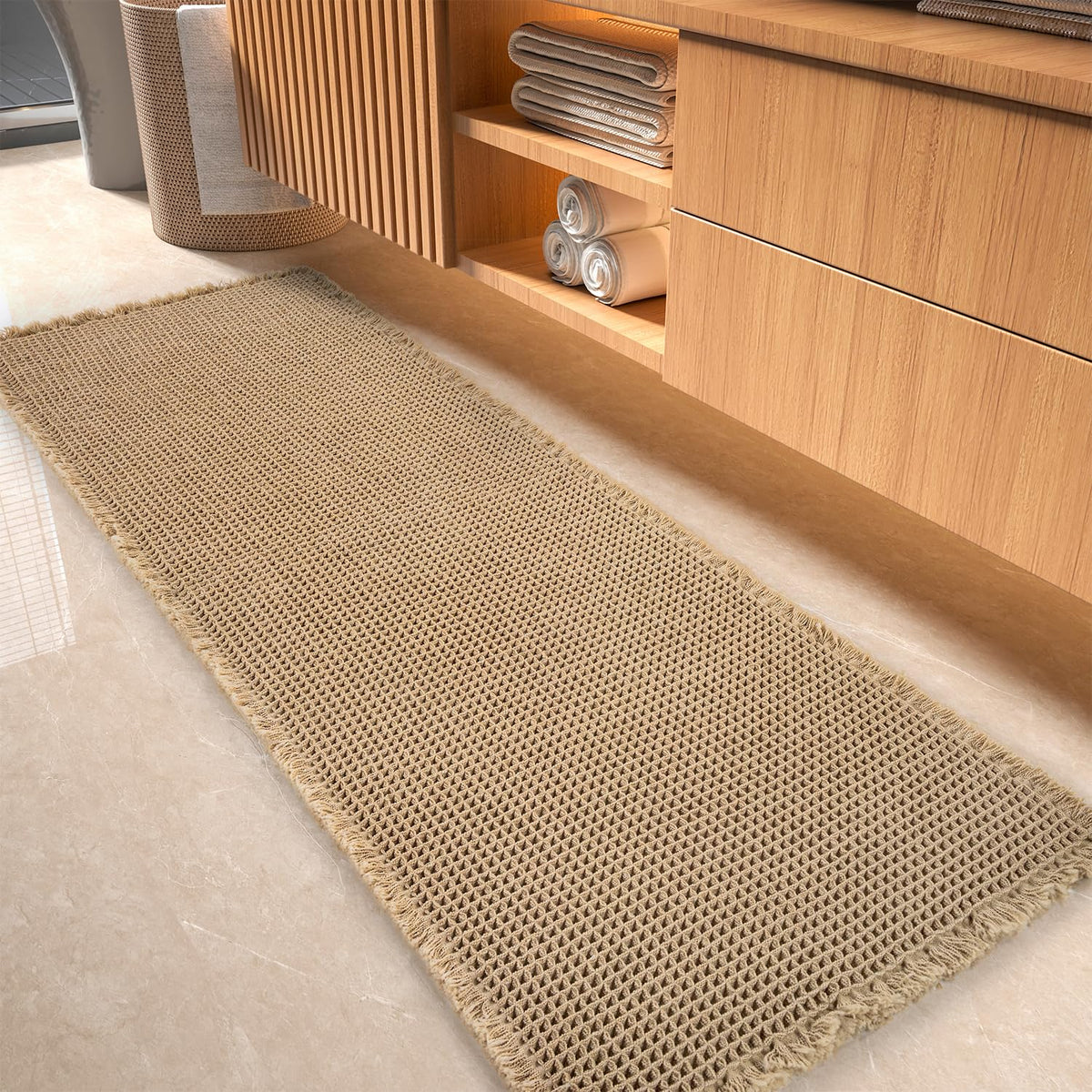 tchdio waffle bath mat with absorbent texture helps feet dry quickly.