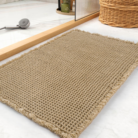 tchdio Waffle Bath Mat shows absorbent surface soaking up water quickly for a dry floor