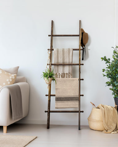 TEAKMAMA rustic blanket ladder doubles as decorative storage in any room.