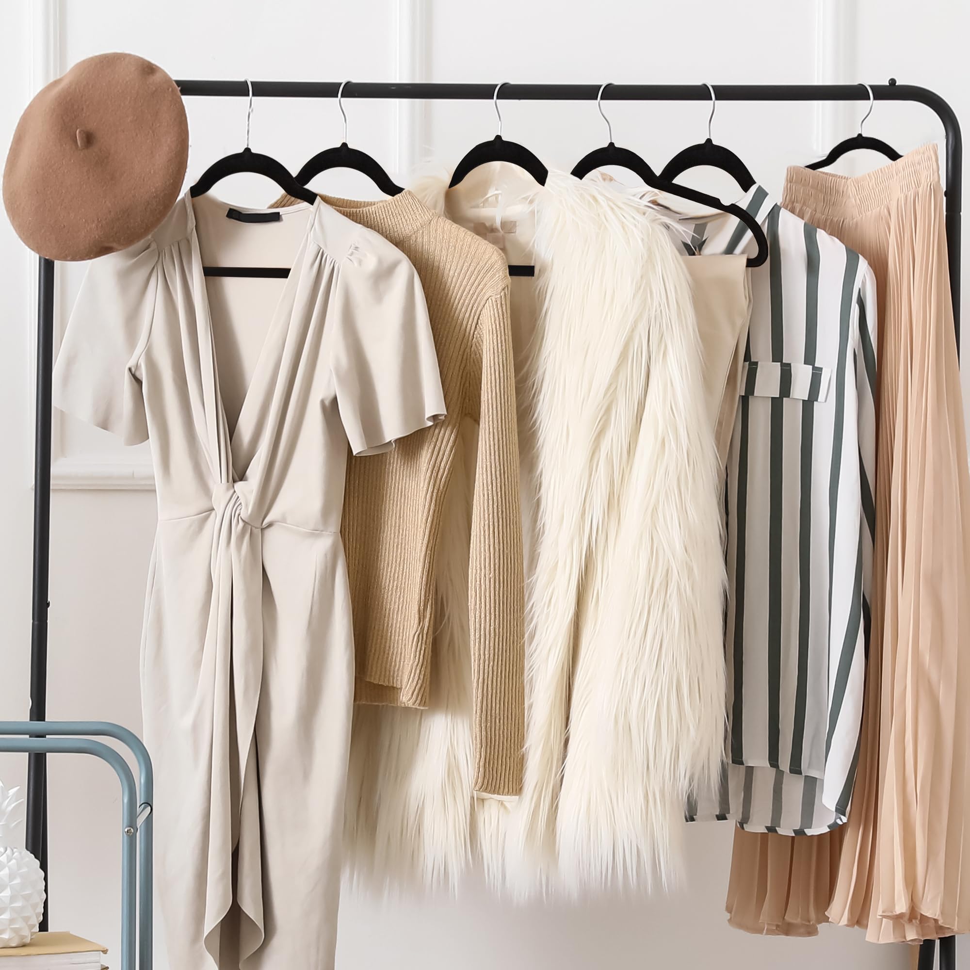 TechZoo velvet hangers in a black finish for a sleek closet look