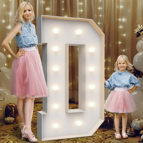 Teebloom 4ft marquee letter D glowing as an outdoor party backdrop