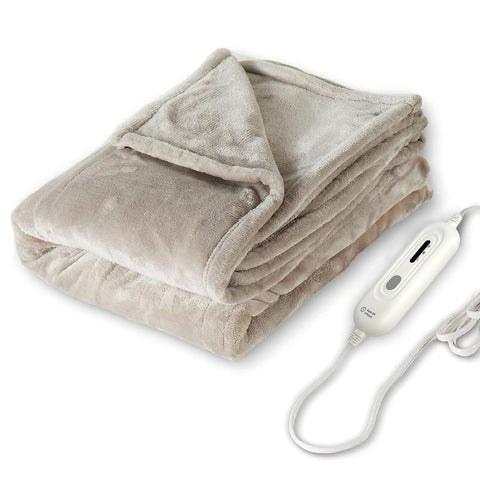 Tefici heated blanket throw on bed for cozy warmth