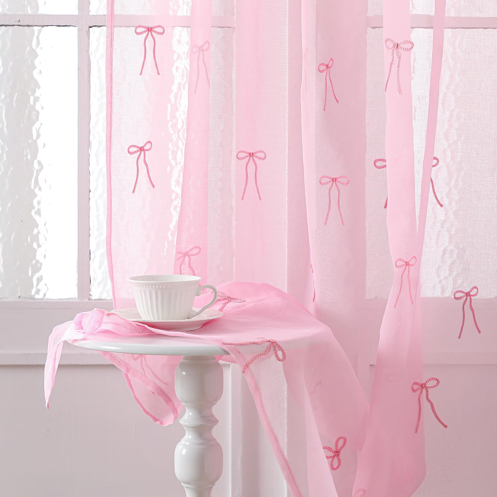Tegeme 2-panel pink bow sheer curtains filter light softly for 84-inch windows.