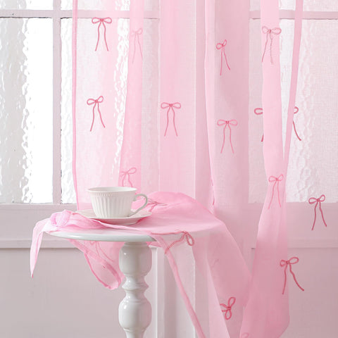 Tegeme 2-panel pink bow sheer curtains filter light softly for 84-inch windows.
