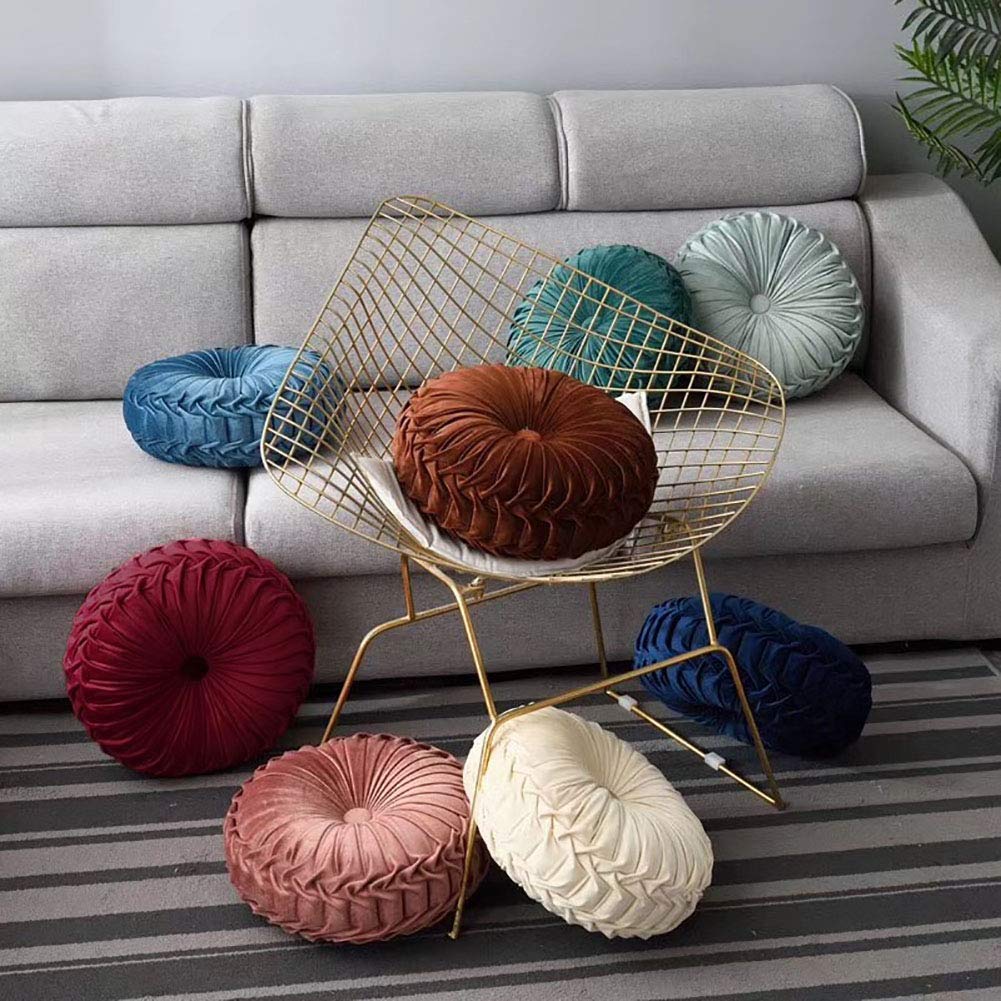 Teieas round pillow used as car decor to brighten travel seating