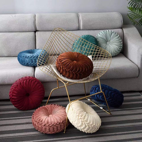 Teieas round pillow used as car decor to brighten travel seating