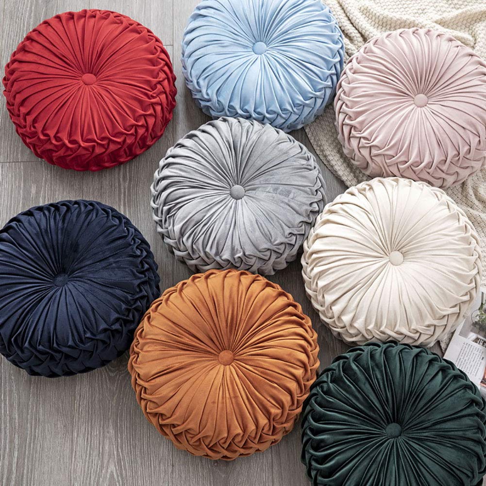 Teieas round velvet pillow closeup shows soft-touch fabric and refined button accent