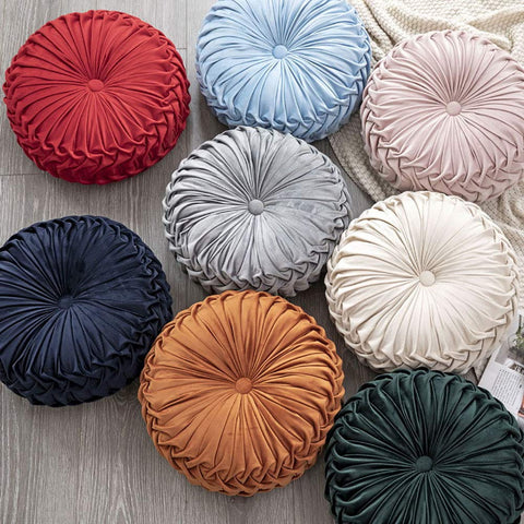 Teieas round velvet pillow closeup shows soft-touch fabric and refined button accent