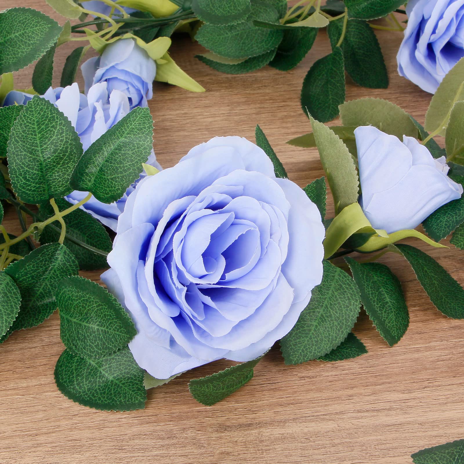 TELDRASSIL blue rose garland leaves detail, durable crepe fabric for maintenance-free decor.