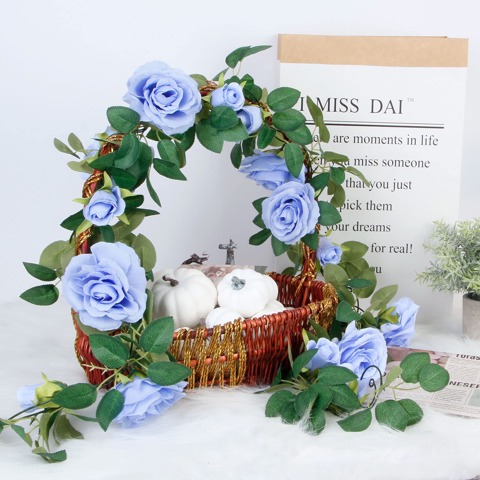 TELDRASSIL blue rose garland on wedding arch, creates romantic color accents.