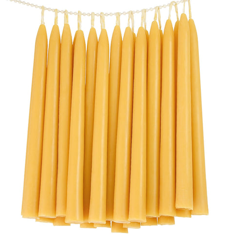 TELOSMA 24-pack beeswax taper candles in a yellow box for bulk gifting.