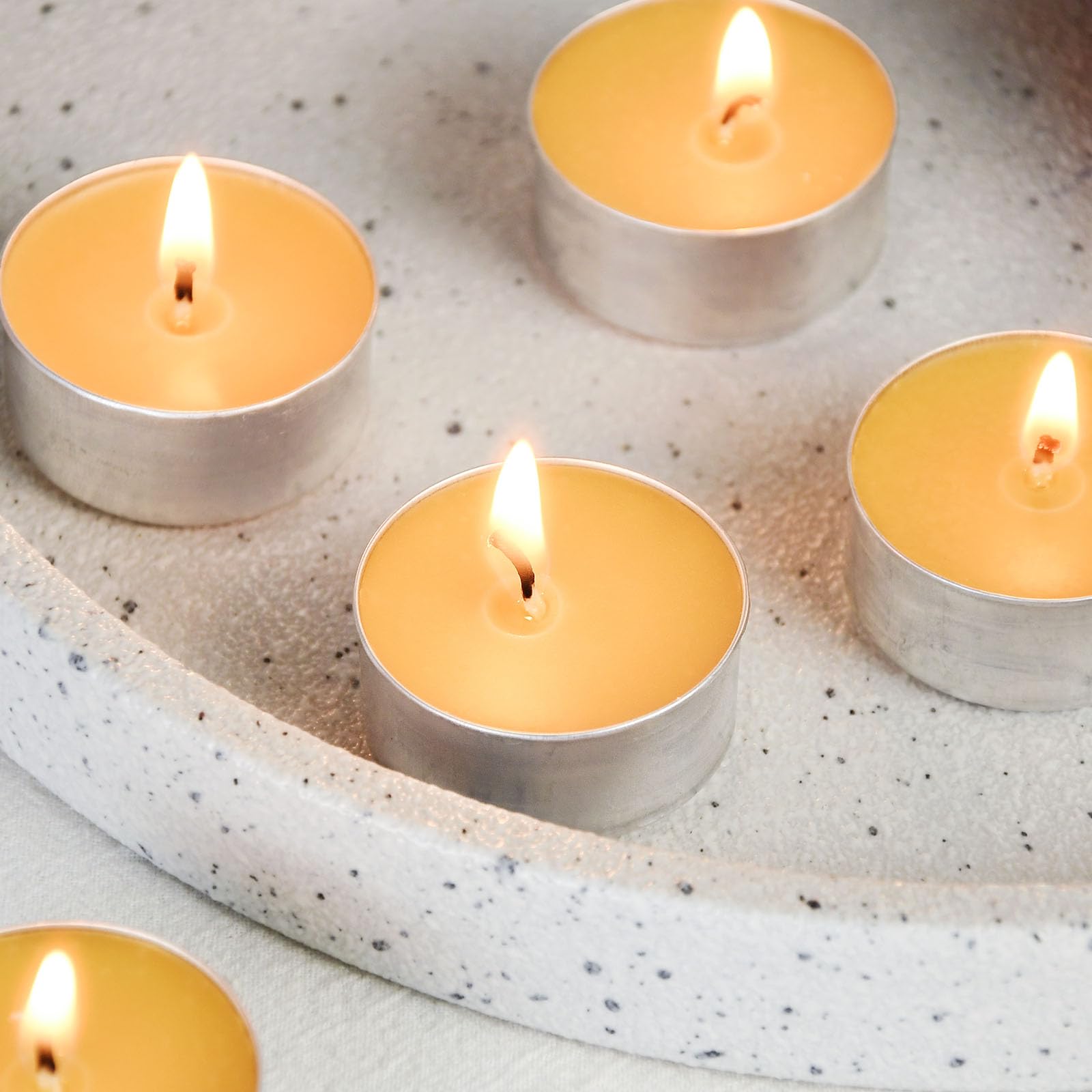 TELOSMA candles arranged for romantic ambience.