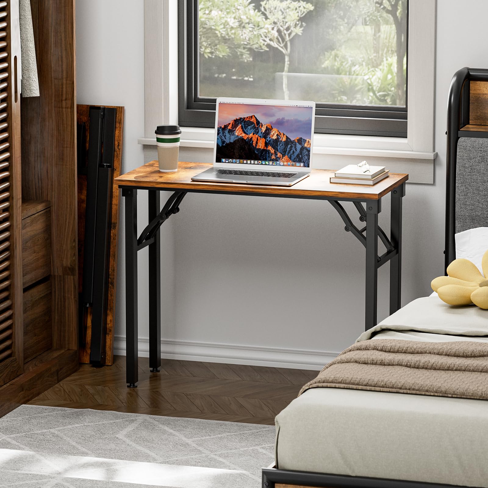 TEMI dorm-room setup illustrates a compact desk in a small living space.