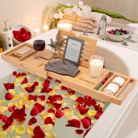 Temple Spring bamboo exfoliating gloves provide spa‑like scrubbing during a soak.
