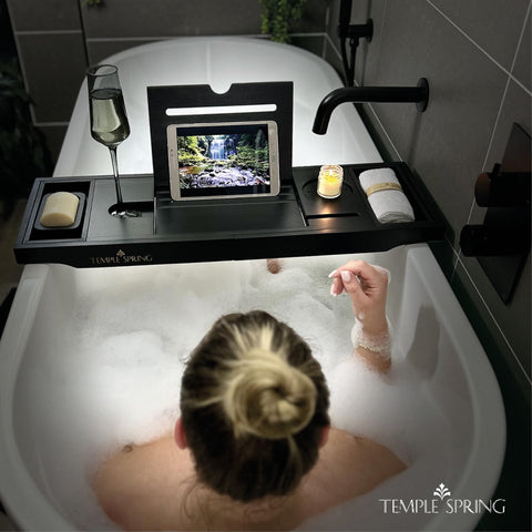 Temple Spring bamboo soap dish keeps bath essentials within reach.