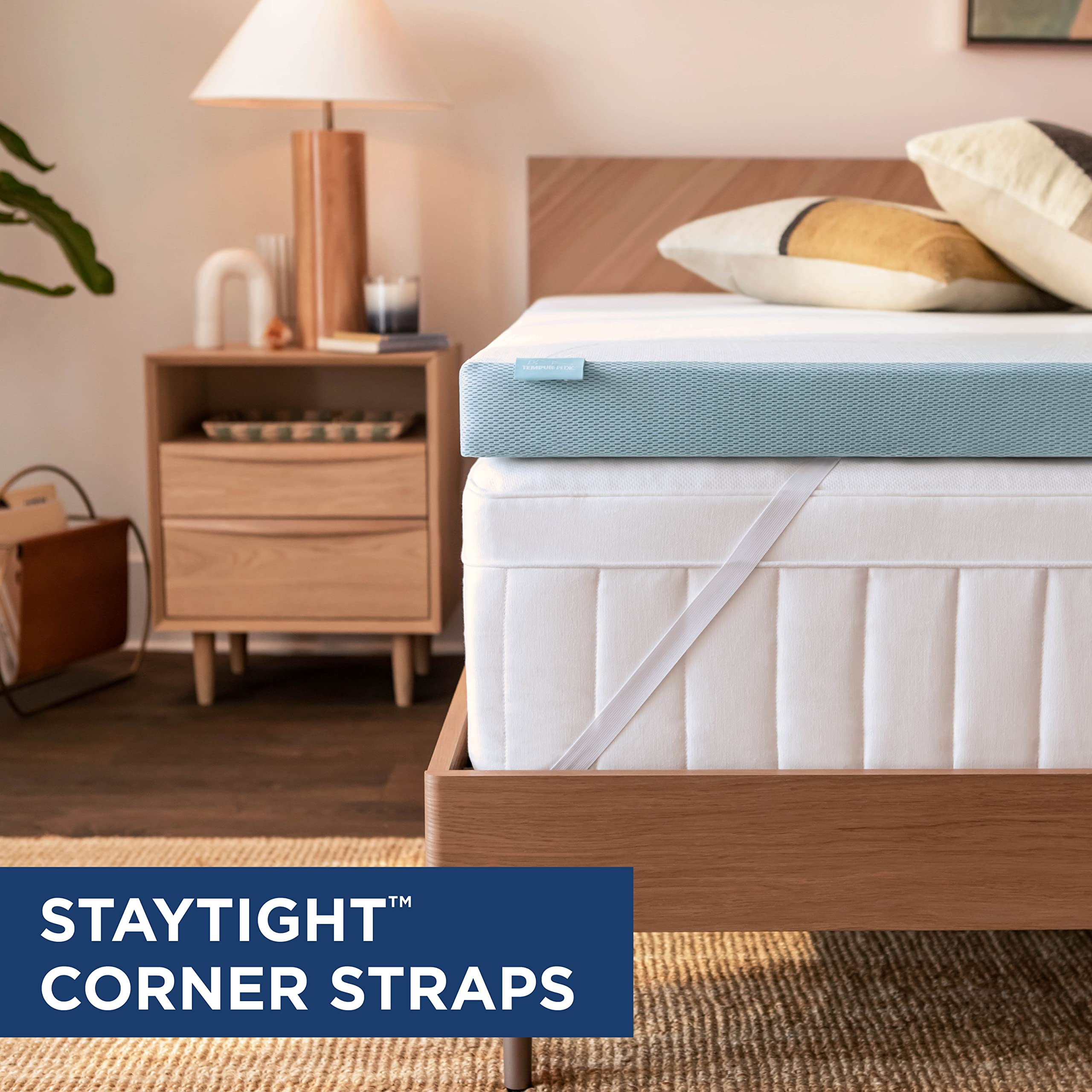 Tempur-Pedic bedroom scene featuring cooling topper and bed setup