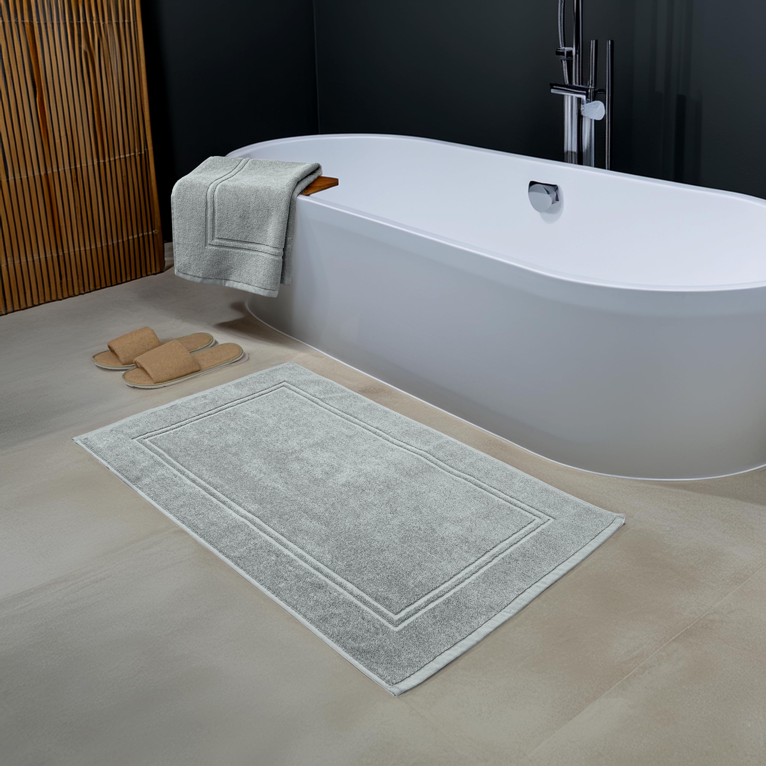 Two-pack Tens Towels bath mats provide easy, coordinated bathroom updates.