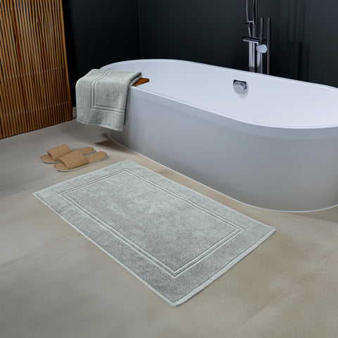 Two-pack Tens Towels bath mats provide easy, coordinated bathroom updates.