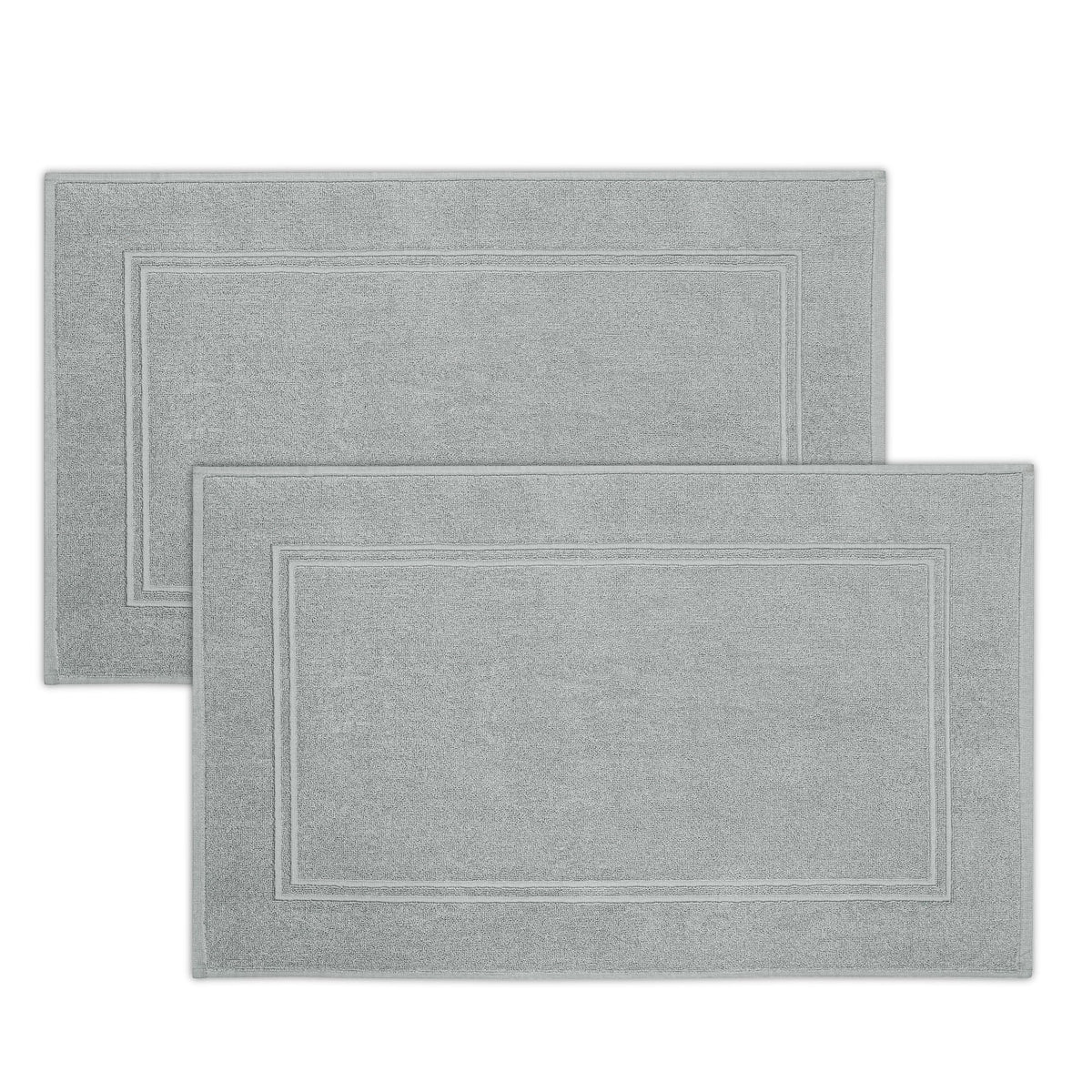 Tens Towels bath mat close-up shows plush terry softness for cozy feet.
