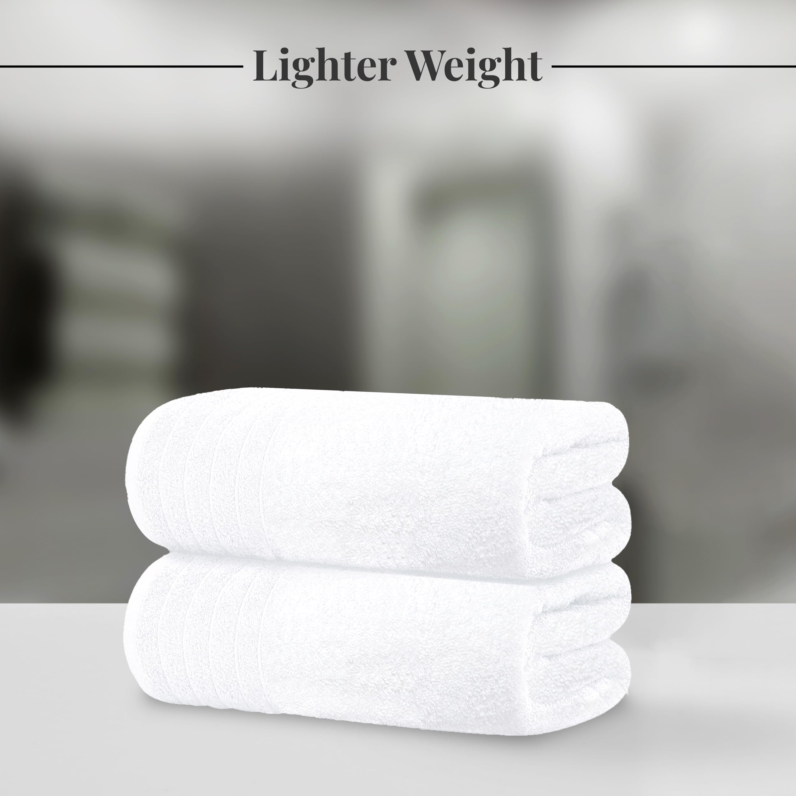 Tens Towels white bath sheet demonstrates quick-dry lightweight feel.