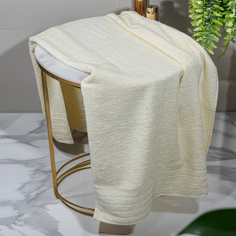 Tens Towels bath sheet cream towel stack demonstrates organized closet storage