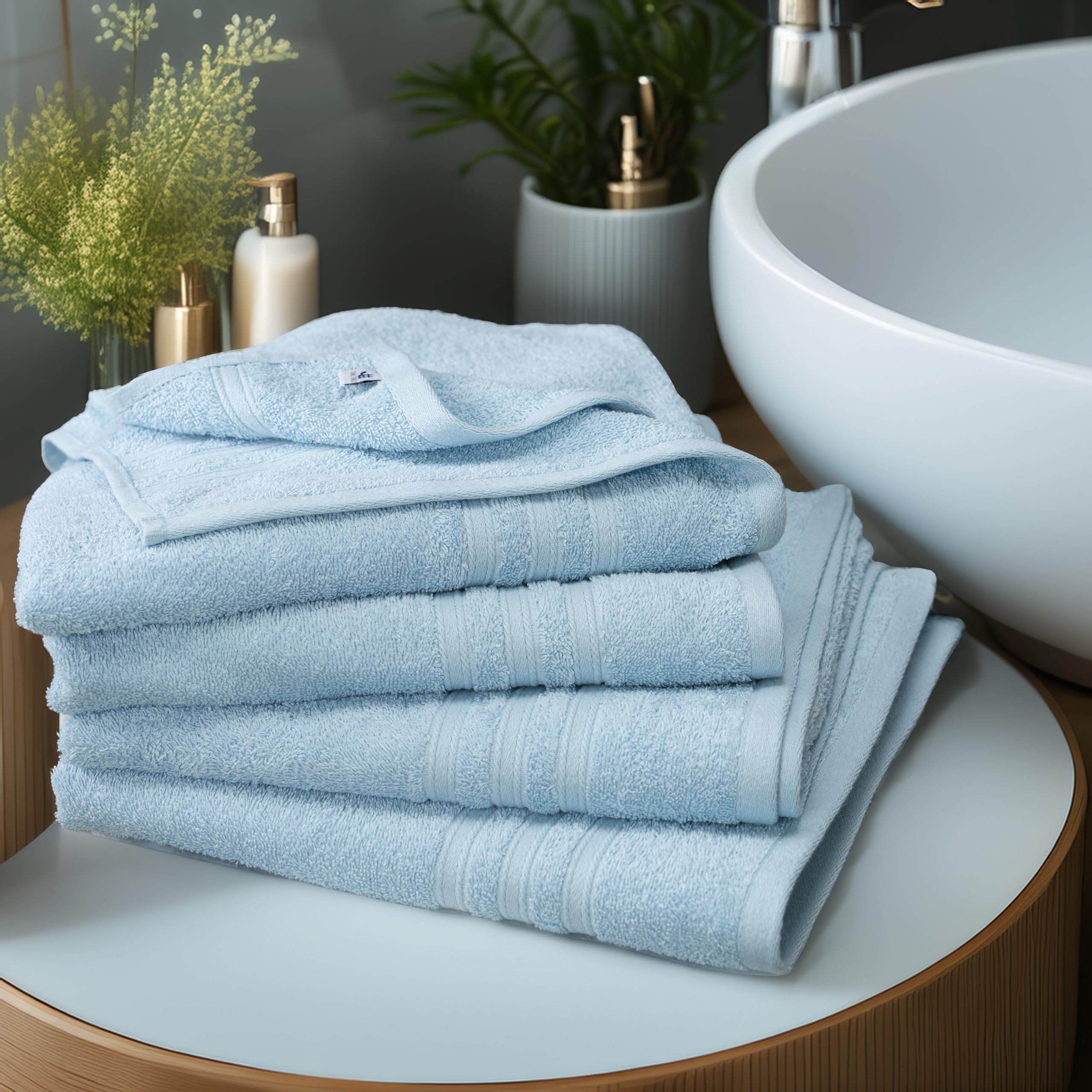 Tens Towels size 27x54 inches displayed for reference.