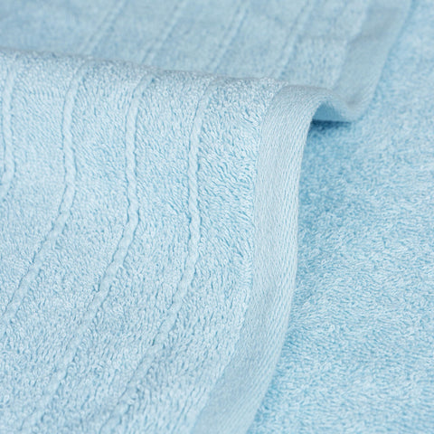Bathroom display featuring Tens Towels color and size for family use