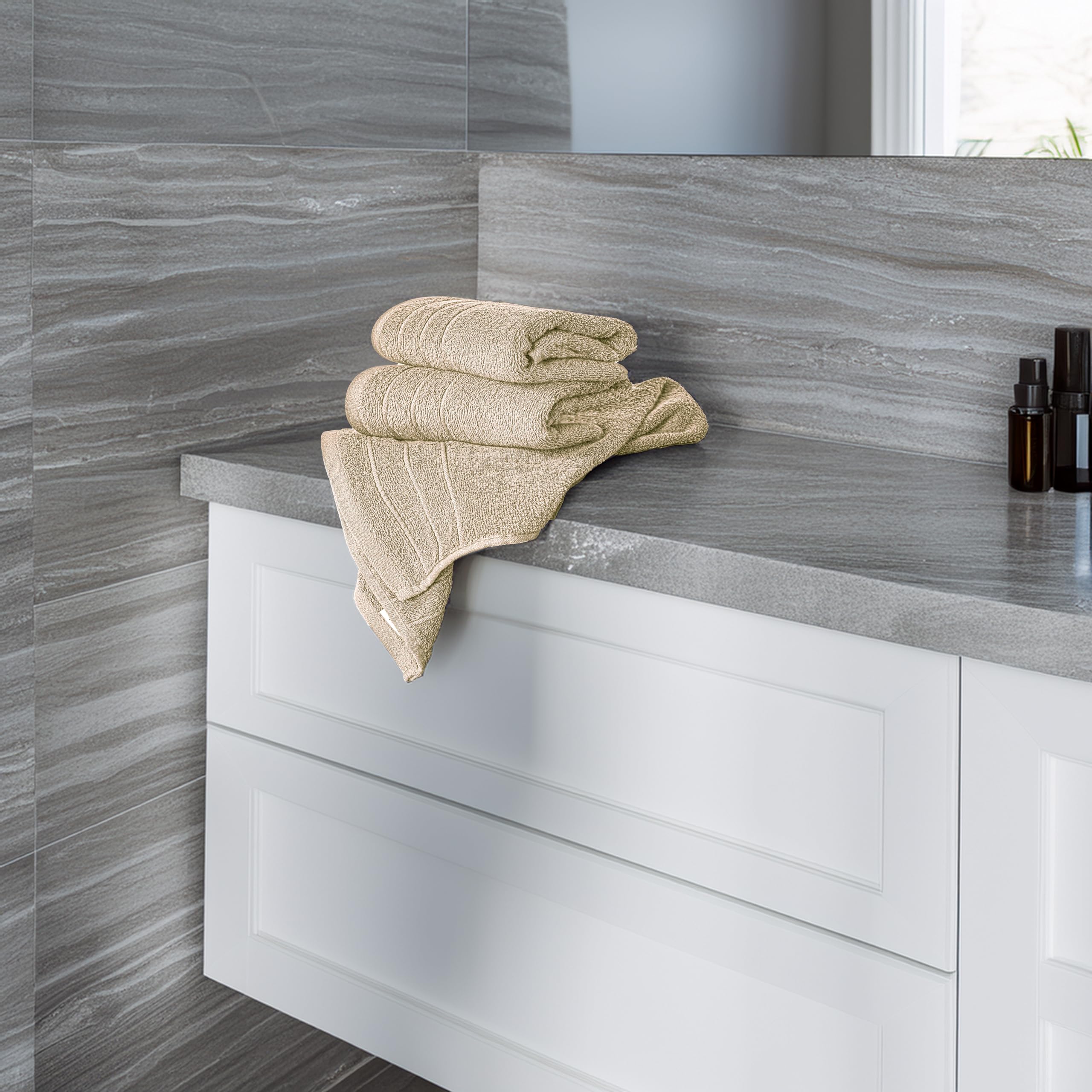 Beige Tens Towels closeup shows soft fibers for gentle drying.