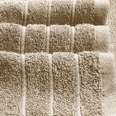 Tens Towels jumbo beige bath sheet — ideal for lounging and spa-like comfort.