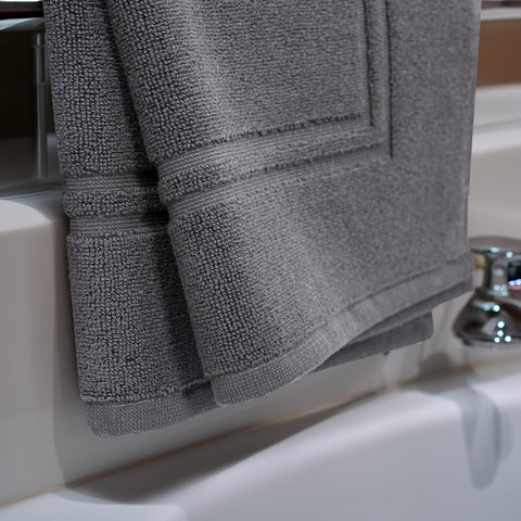 Tens Towels dark grey bath mats add modern style