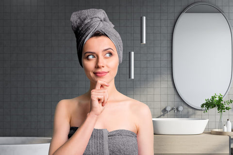Tens Towels dark grey color adds a modern bathroom accent.