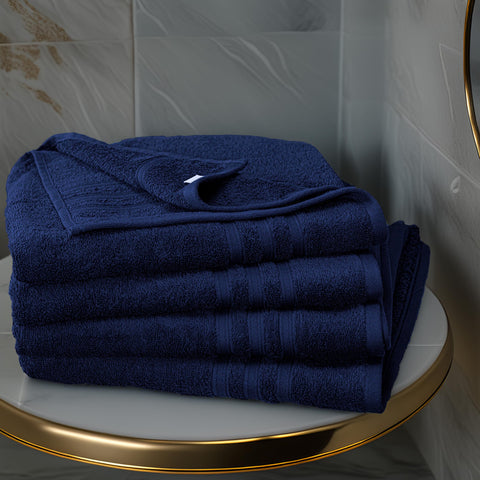 Eco-certified Tens Towels navy bath towels in green production setting