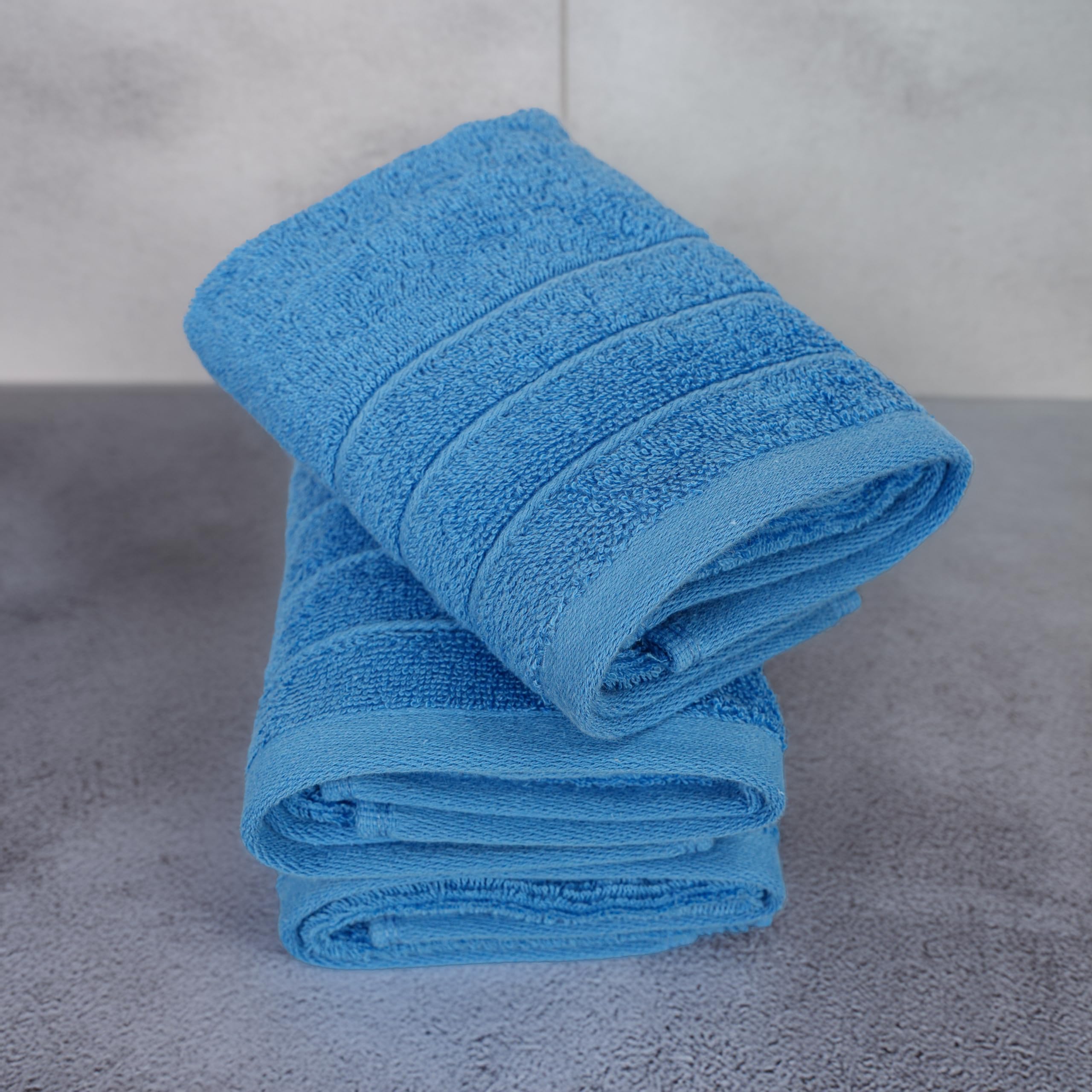 Tens Towels folded-blue-towel-pack neatly displayed for compact storage.