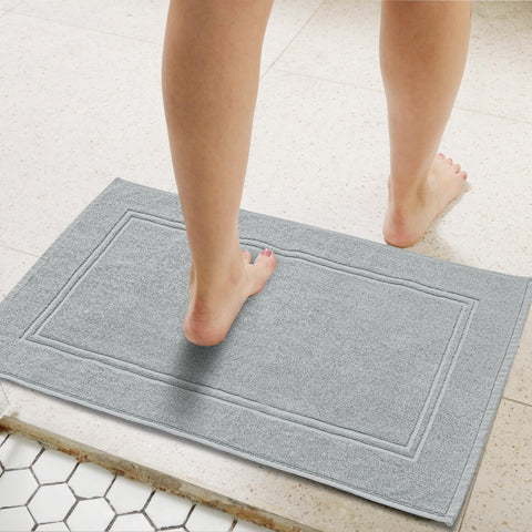 Green and Oeko-Tex certified Tens Towels facility badge highlights eco-friendly production.