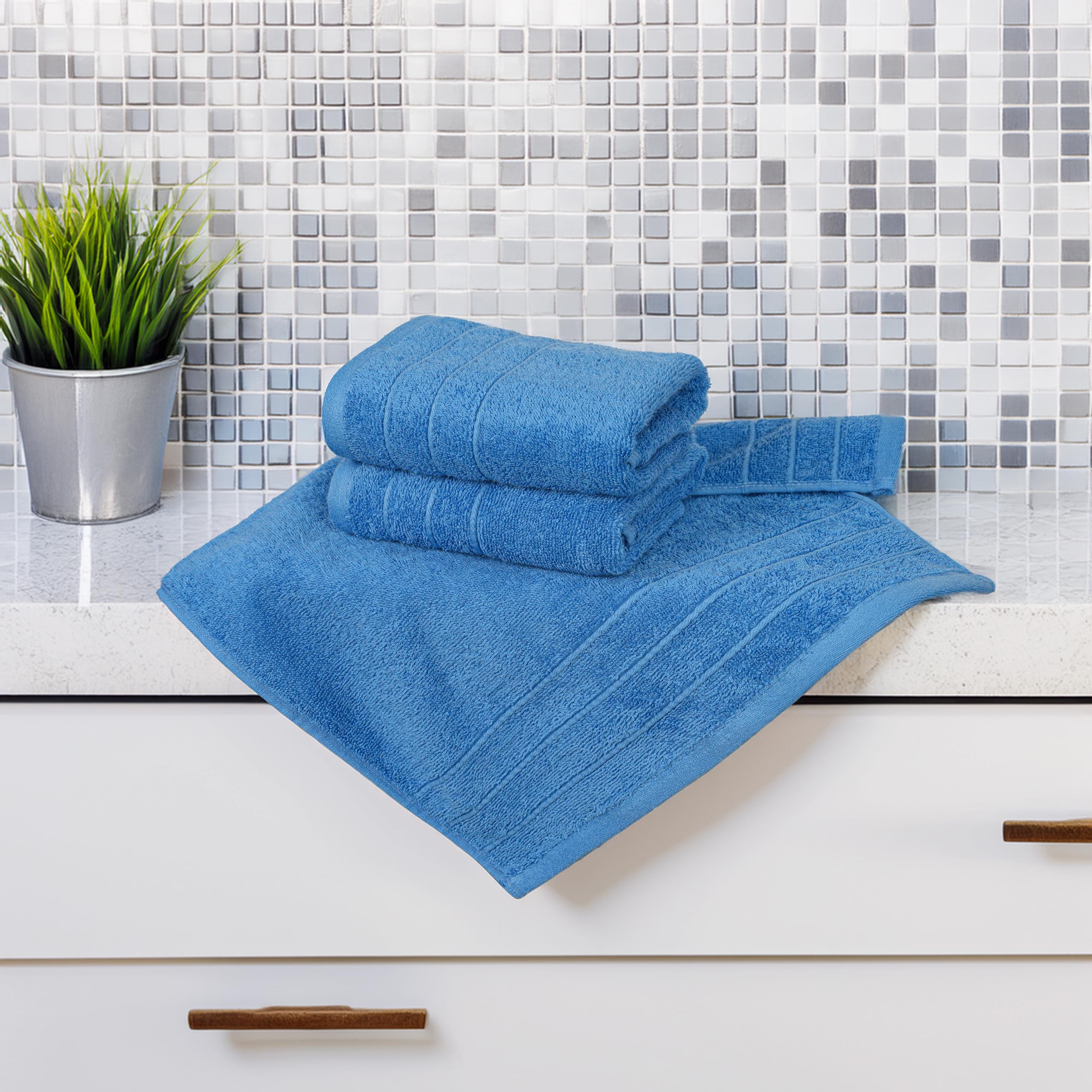 Tens Towels hanging in bathroom rack demonstrates everyday convenience.