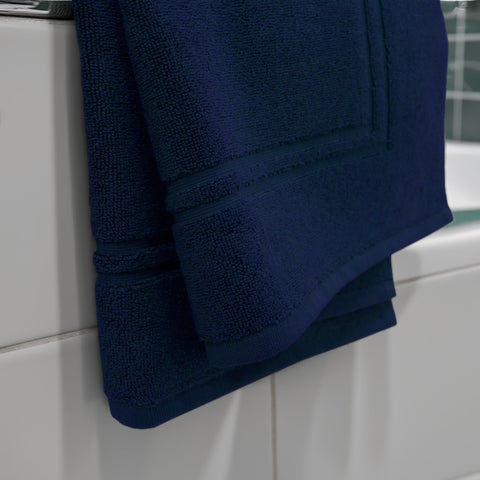 Tens Towels hotel-quality bath mats with durable, plush underfoot sensation.