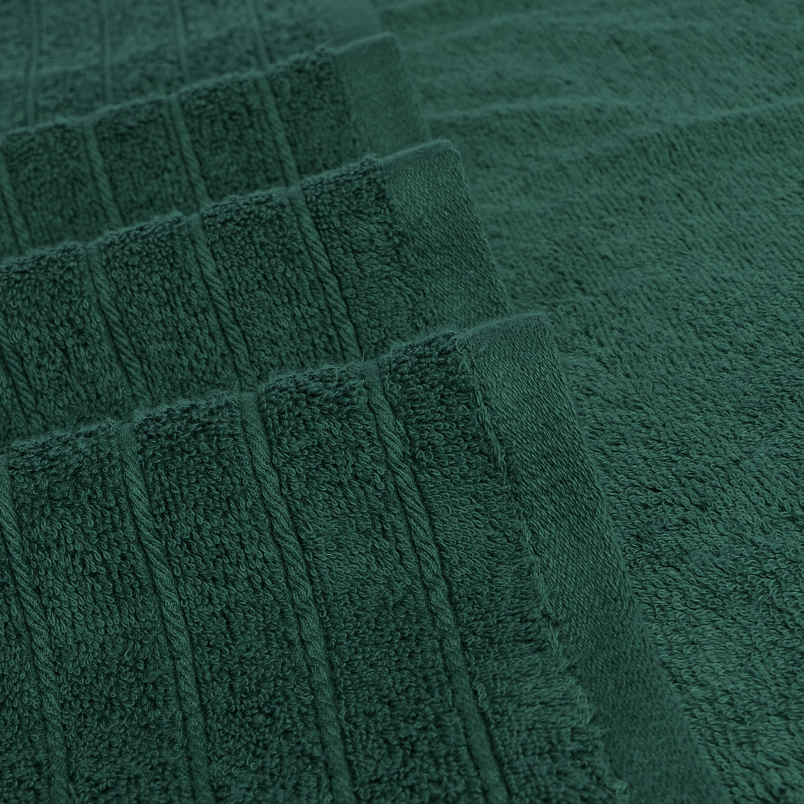 Tens Towels hunter green color adds spa-like tone to bathroom.
