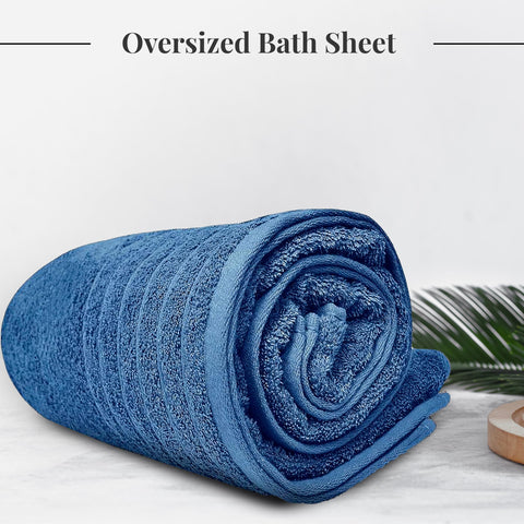 Tens Towels blue wrap-around image shows generous coverage and luxe softness