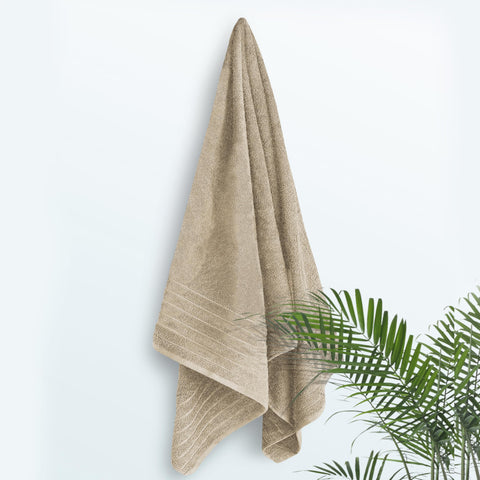 Tens Towels lightweight beige bath sheet — easy to carry and quick to dry.