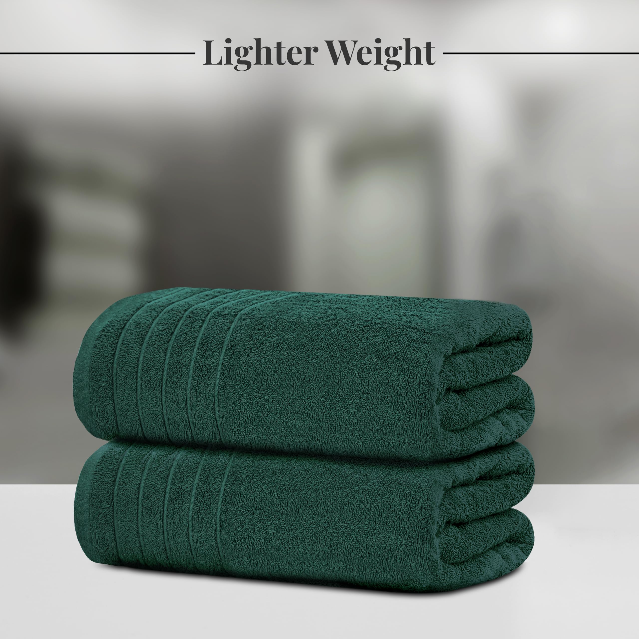 Tens Towels oversized bath sheet on hook showing generous dimensions.