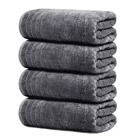 Tens Towels pack of four extra-large 30x60 towels, offering generous coverage for full-body wraps.