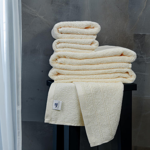 Tens Towels four washcloths laid out for gentle face cleansing.